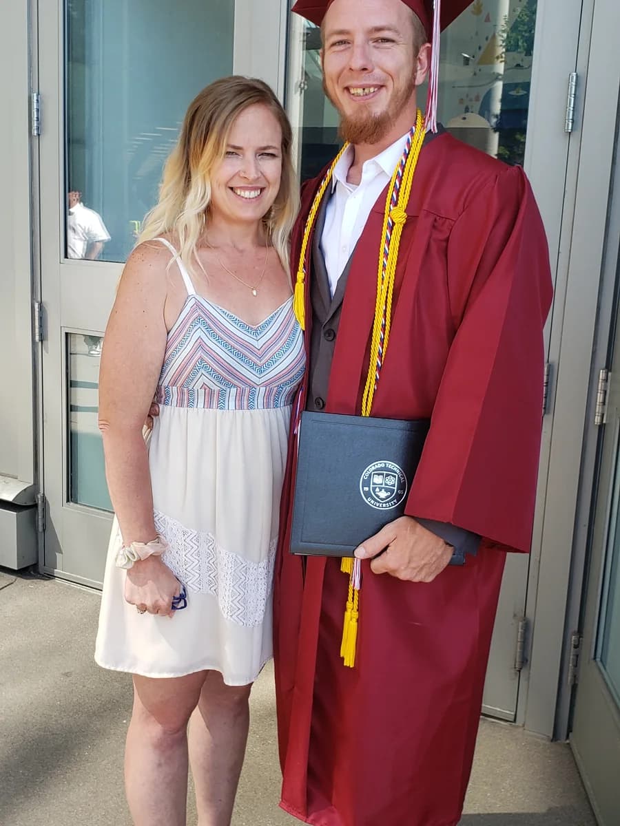 Patrick Keller with his wife and co-founder at his graduation